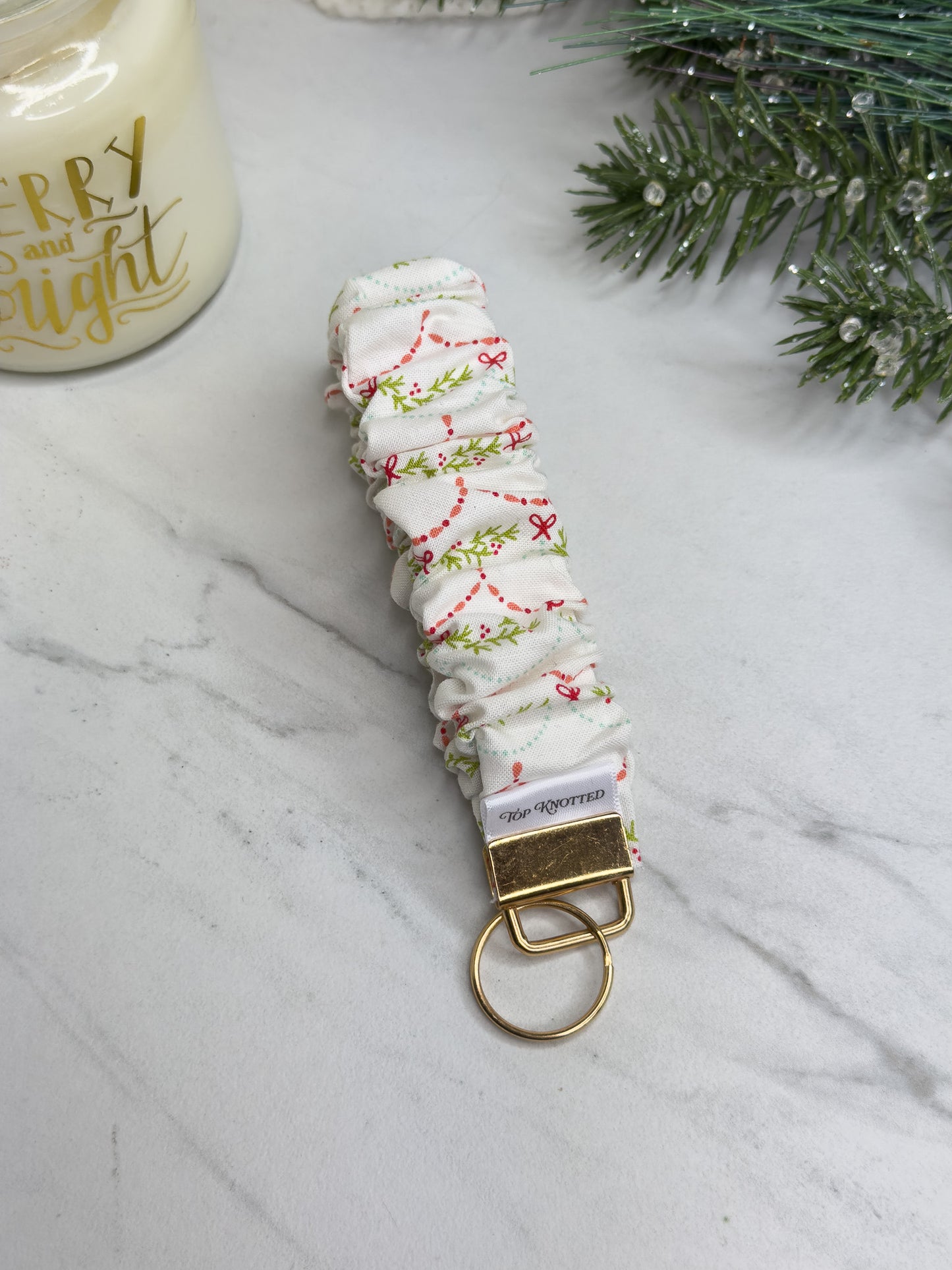 Garland Glow Scrunchie Wristlet