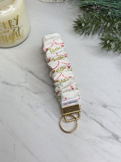 Garland Glow Scrunchie Wristlet