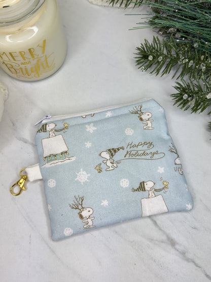 Fabric pouch with Christmas-themed design 