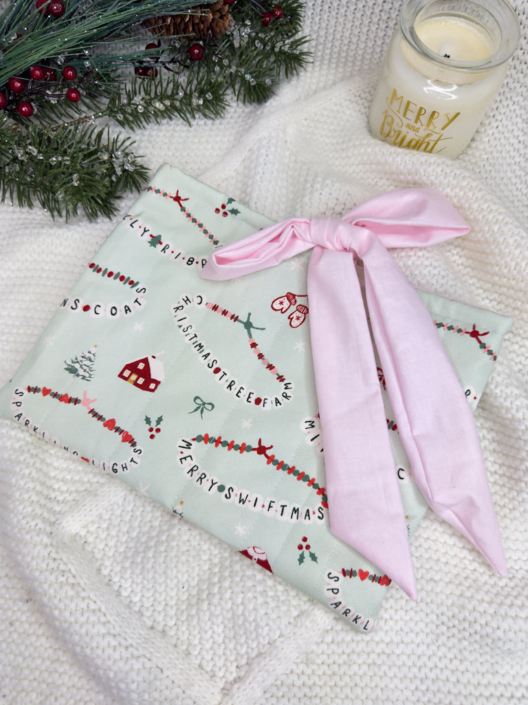 Swiftmas Bracelets Quilted Book Sleeve